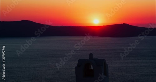 Sun Falling Over The Mountains Of Santorini