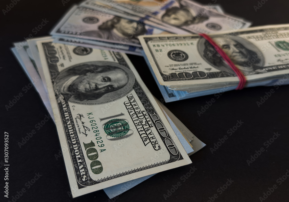 Money, US hundred dollar bills background on white wooden background. Money is scattered on the table. Finance and economics concepts.Money accumulation concept.Currency saving.Investment.Copy space. Money, US hundred dollar bills background on white wooden background. Money is scattered on the table. Finance and economics concepts.Money accumulation concept.Currency saving.Investment.Copy space.