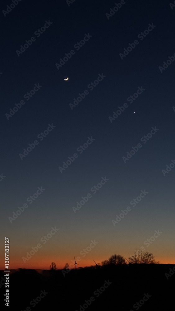 Fototapeta premium Moon and Venus. sunset, landscape silhouette