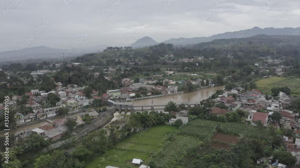 Aerial view of the Katulampa dam in Bogor, Indonesia during flood conditions