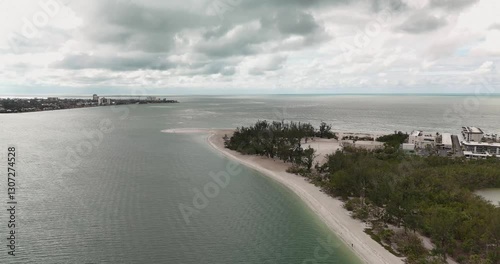 Lido Key, Sarasota, FL, USA - 02-20-2025: Winter aerial video of the vacation beach community, Lido Key, Sarasota, FL, on the Gulf of Mexico.
