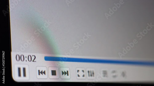 Play button press Video player started Universal counting leader Camera shot of a computer screen
Camera shot of a computer screen. Cursor clicks on PLAY button on video player. Universal counting