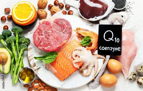 Food high in coenzyme Q10 on light gray background.