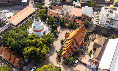 Aerial view of Wat Ket Karam Temple in Chiang Mai, Thailand, showcasing traditional architecture and lush greenery