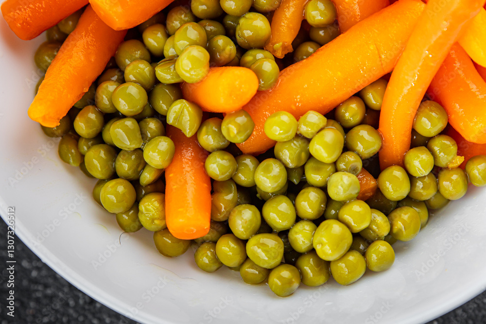 Green peas and carrot canned food tasty fresh delicious gourmet food background table rustic food top view copy space keto and paleo diet vegetarian and vegan food Green peas and carrot canned food tasty fresh delicious gourmet food background table rustic food top view copy space keto and paleo diet vegetarian and vegan food