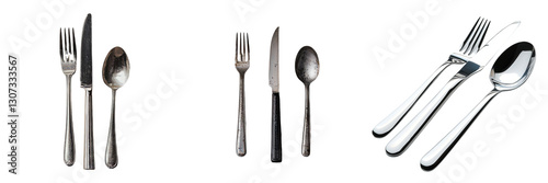 On a white background, a fork, knife, spoon, and teaspoon are isolated with a clipping path included