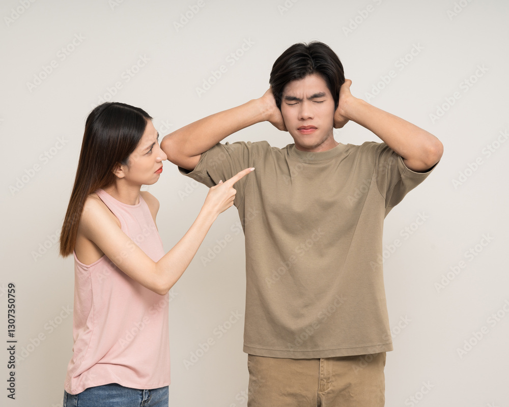 Bad relationship unhappy asian couple quarreling in various action gesture standing on isolated white background. Shouting angry man and woman stressed has problem in Married life Bad relationship unhappy asian couple quarreling in various action gesture standing on isolated white background. Shouting angry man and woman stressed has problem in Married life