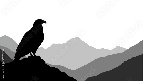 Eagle silhouette perched on mountain peak