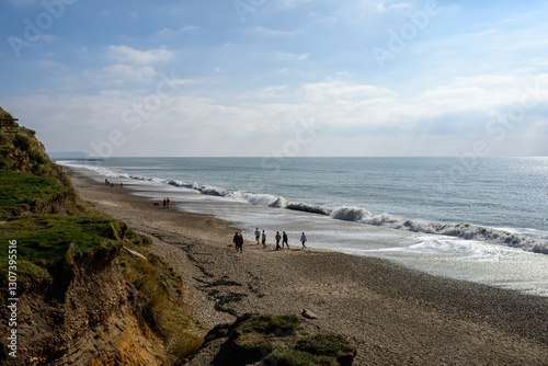 Fototapeta Naklejka Na Ścianę i Meble -  beautiful beach at Hengistbury Head Dorset England with waves and blue sky in the background