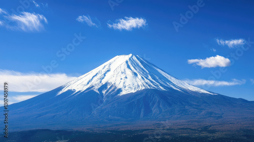 Majestic snow-capped mount fuji against clear blue sky in japan