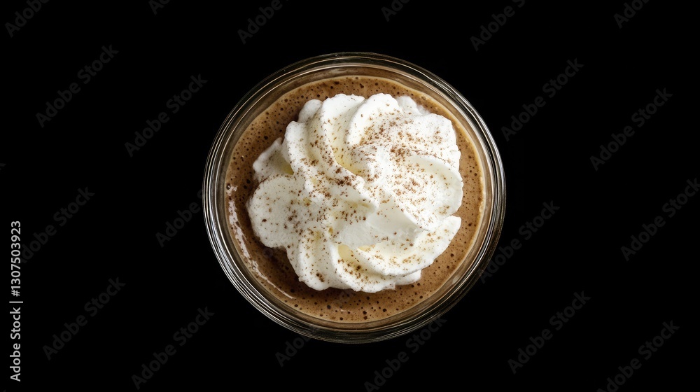 A creamy French mousse au chocolat served in a glass cup with a dollop of whipped cream. A creamy French mousse au chocolat served in a glass cup with a dollop of whipped cream.