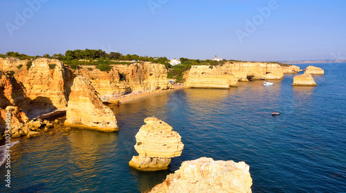 walking path with breathtaking views through the coast from porches to benagil caves lagoa algarve portugal