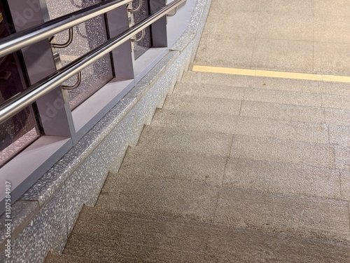 Stairs that incorporate valuable Accessibility Features within a Modern Setting and Design. The interior stairs incorporate tactile paving elements designed specifically to enhance accessibility