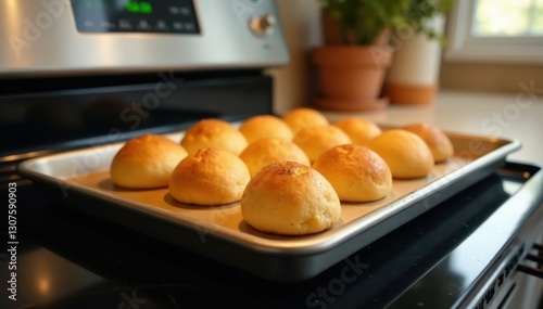 Baking sheet on electric stove, warming bread, culinary, design
