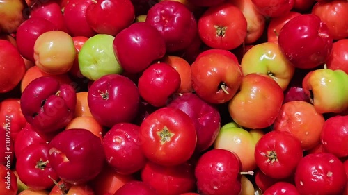 Acerola. Acerola fruit, rich in vitamins. Red fruits piled up