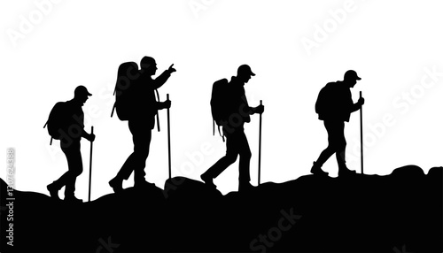 Hikers climbing rocky terrain in silhouette