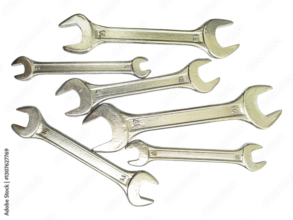 A collection of shiny metal wrenches scattered on a white background. This image conveys concepts of repair, maintenance, DIY, and problemsolving. A collection of shiny metal wrenches scattered on a white background. This image conveys concepts of repair, maintenance, DIY, and problemsolving.