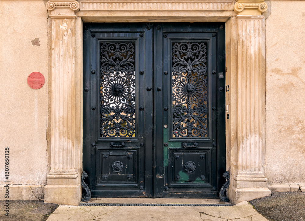 Old building facade featuring wooden door.For the background of your photos and collages Old building facade featuring wooden door.For the background of your photos and collages