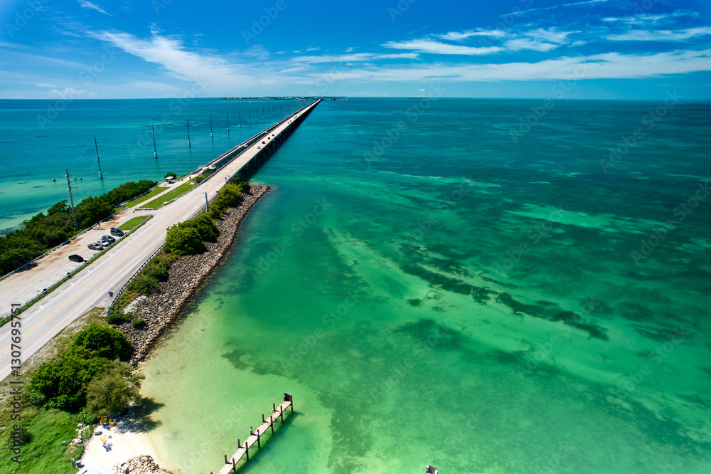 The old Aquaduct at the beginning of the Long Key Historic Bridge Trailhead in the Florida Keys between Long Key and Duck Key is a tourist and travelers paradise
The old Aquaduct at the beginning of the Long Key Historic Bridge Trailhead in the Florida Keys between Long Key and Duck Key is a tourist and travelers paradise