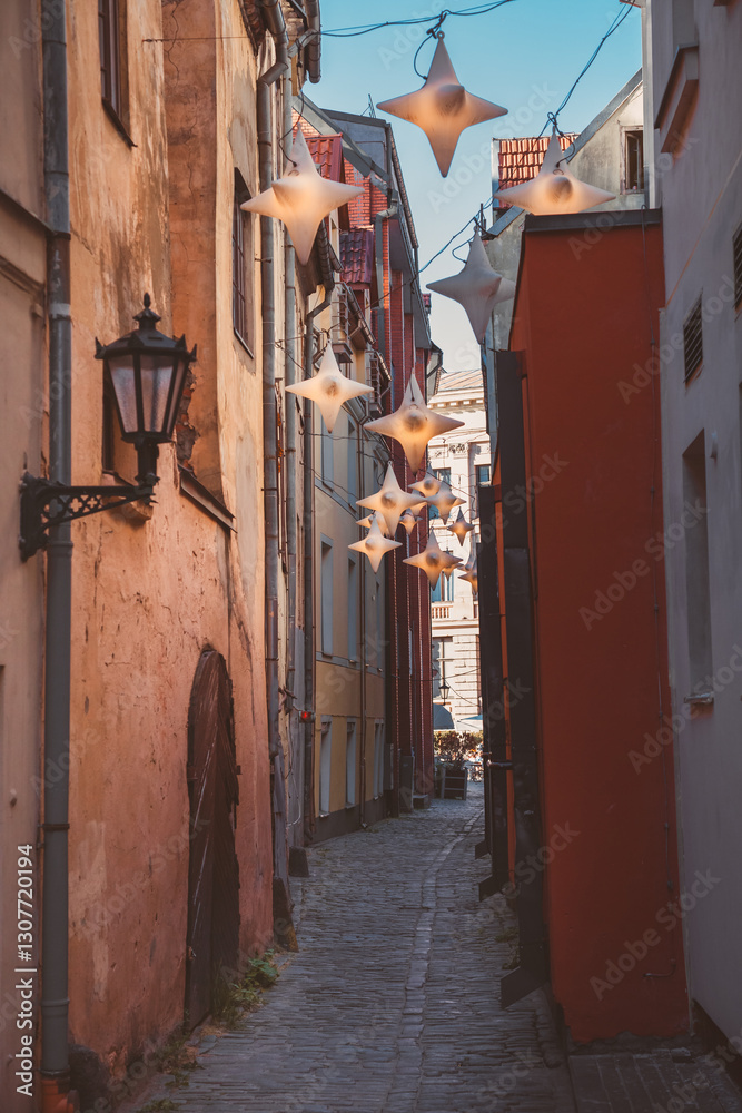 Fototapeta premium The narrowest street in Riga is medieval Rozena Street in the old part of the city. Riga, Latvia.