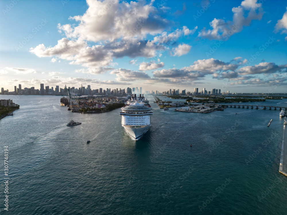 Cruise ship voyage. Aerial view of cruise in summer vacation. Cruise ship tour and travel at sea. Aerial view of luxury liner voyage. Ship leaving Miami beach port. Miami tour. Harbor cruise Cruise ship voyage. Aerial view of cruise in summer vacation. Cruise ship tour and travel at sea. Aerial view of luxury liner voyage. Ship leaving Miami beach port. Miami tour. Harbor cruise