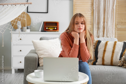 Teenage girl with laptop vi...