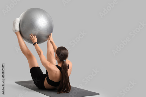 Sporty young woman training...