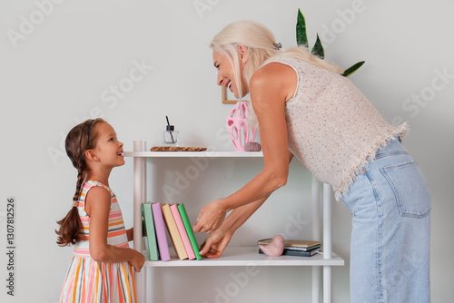 Little girl with her grandm...