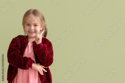 Happy little girl with rais...