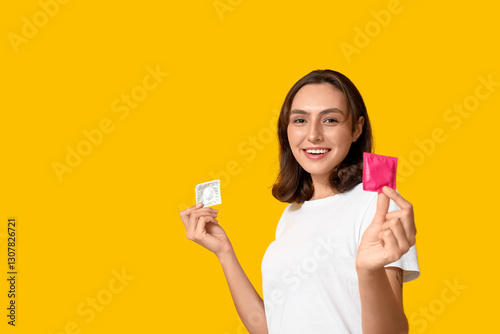 Young woman with condoms on...