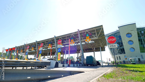 Cars at modern toll road turnpike