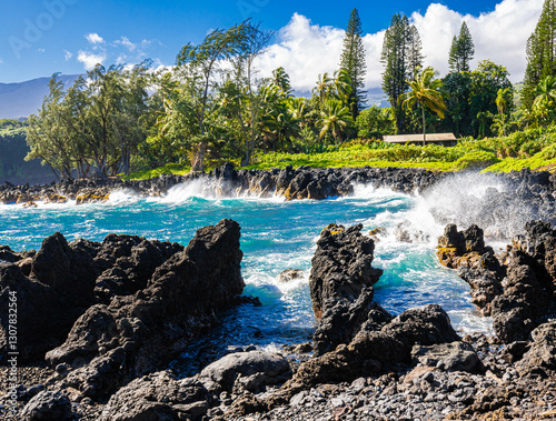 Waves Crashing Against The Volcanic Shoreline at Keanae Lookout, Keanae, Maui, Hawaii, USA photo