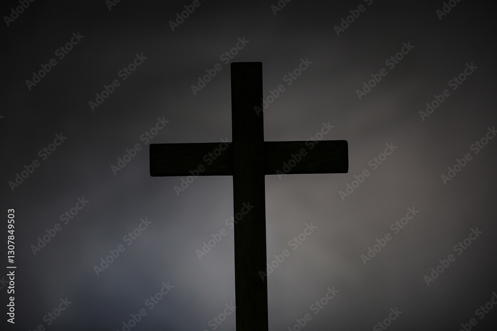 Wooden cross on grey background. Good Friday concept Wooden cross on grey background. Good Friday concept