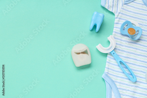 Baby clothes with toothbrus...