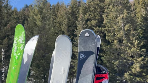 Winter scenery with skis on the gondola going up in ski lift on a snowing day