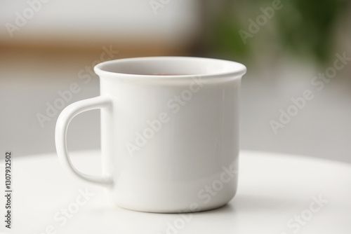 White ceramic coffee mug on...