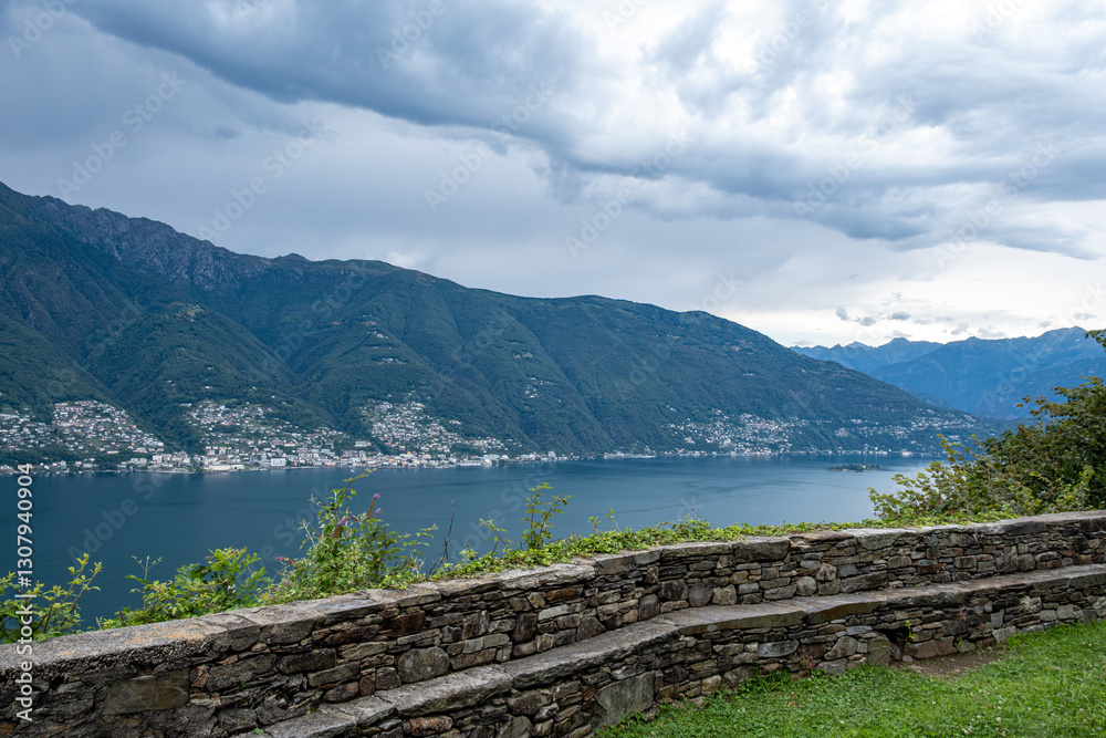 Fototapeta premium Scenic View over the Lago Maggiore in Italy with Ancona (Switzerland) and Mountains in the Background.