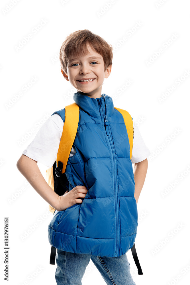 Cheerful little boy wearing yellow backpack looking away on white background. Back to School. Smiling kid. Cheerful little boy wearing yellow backpack looking away on white background. Back to School. Smiling kid.
