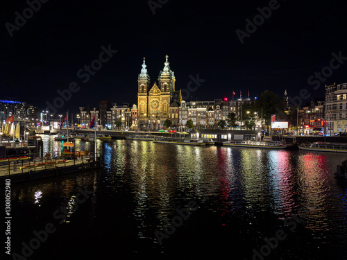 Photography Beautiful aerial view of Amsterdam Stichting Muziek in de Nicolaas near the Centraal Train Station and its historic hub with canals, bikes, cafes