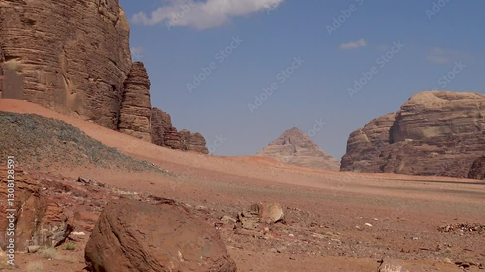 Aerial view of the spectacular rock formations and cliffs in the Wadi Rum National Park Protected Area, Jordan. Aerial view of the spectacular rock formations and cliffs in the Wadi Rum National Park Protected Area, Jordan.
