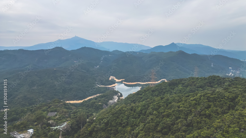 Fototapeta premium View of Lush Forested Mountains and Serene Reservoir Dec 24 2024