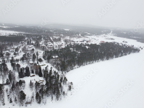 фотографія Inari in Finland is located on the shore of a large lake, where you can enjoy the great outdoors in summer and the Northern Lights in winter