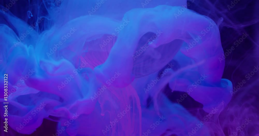 Liquid fume. Round texture. Defocused blue pink neon color water paint splash smoke drop floating on abstract creative background.