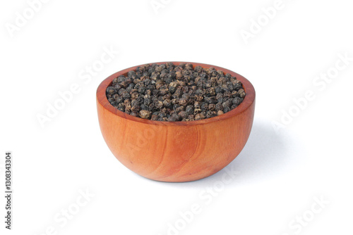 Fototapeta Naklejka Na Ścianę i Meble -  Black peppercorns ( Black pepper ) seeds on wooden bowl isolated on white background. Food ingredients. Aromatic spice