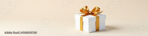 Elegant white gift box with golden ribbon bow, isolated , celebration, isolated