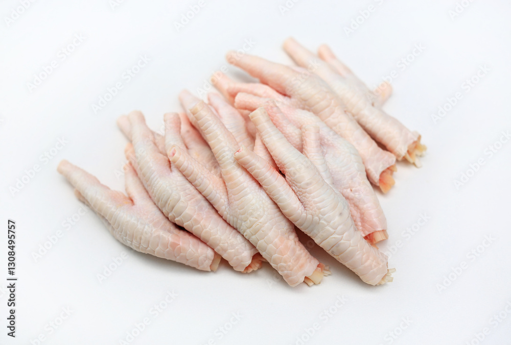 Raw chicken feet isolated on white background. Raw chicken feet isolated on white background.