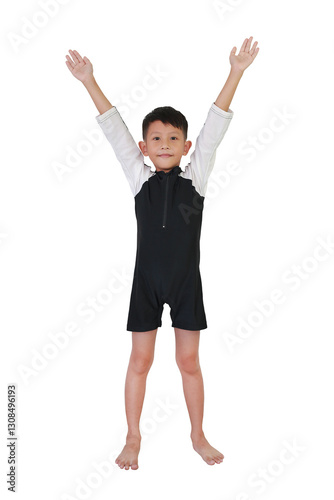 Obraz na płótnie Portrait of Asian boy kid age 7 years old in swimsuit with raised arms posture isolated on white background. Full body photo and standing front view. w salonie