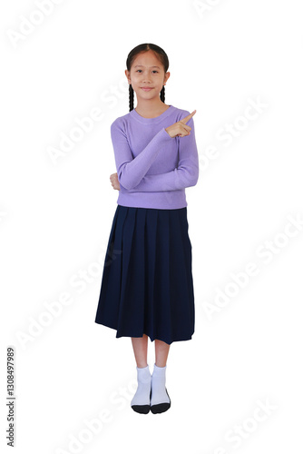 Obraz na płótnie Portrait of Asian girl kid pointing index finger up on empty space and looking camera isolated on white background. Image full length with clipping path, Advertising concept. w salonie