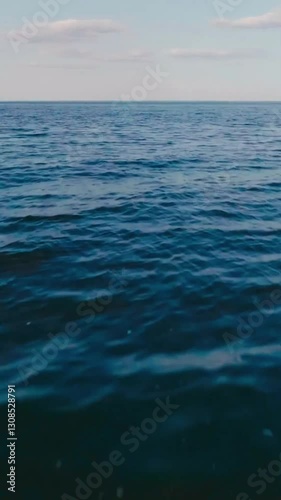 Wallpaper Mural Vertical video of blue tranquil sea with waves and skyline Torontodigital.ca
