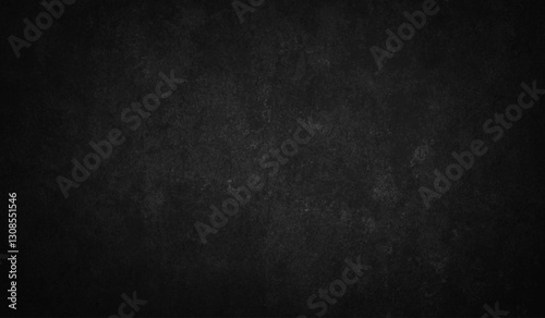 Charcoal wall texture with deep dark surface and subtle grainy pattern. Black background with mineral irregularities and natural stone grain. Natural backdrop for visualization and presentation.